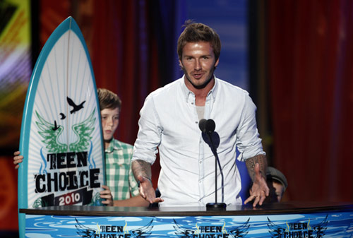 David Beckham, en la imagen con su hijo Brooklyn, fue nombrado Atleta Masculino del año