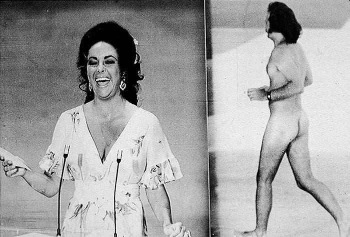 Elizabeth Taylor se ríe a carcajadas al ver al espontáneo desnudo en el escenario de los Oscar