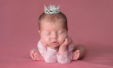 Sleeping Newborn Baby Girl Wearing a Tiara