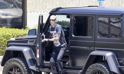 Travis Barker is back to work! The musician is seen at his recording studio after hospital release