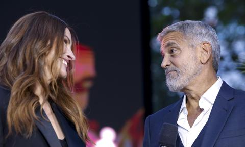 Julia Roberts and George Clooney attend the World Premiere of "Ticket to Paradise