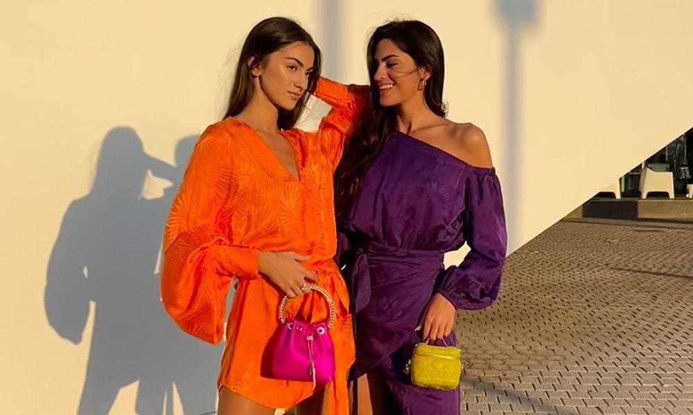 Marta y Meri Lozano siguen la regla de los dos colores y aciertan con sus looks en la preboda de Teresa Andrés