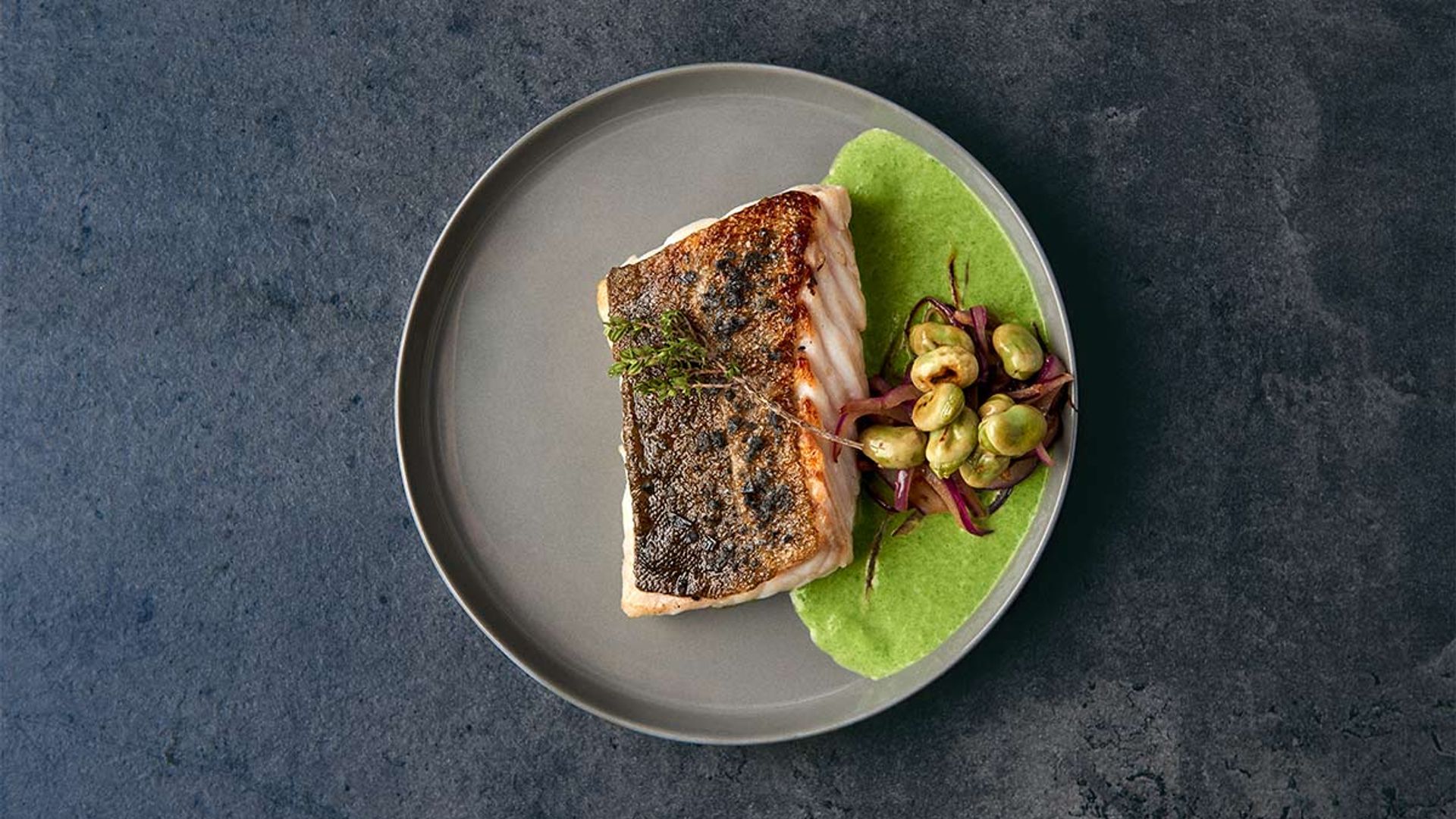 'Skrei' a la plancha con crema de habitas frescas y menta