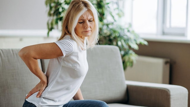 mujer dolor espalda