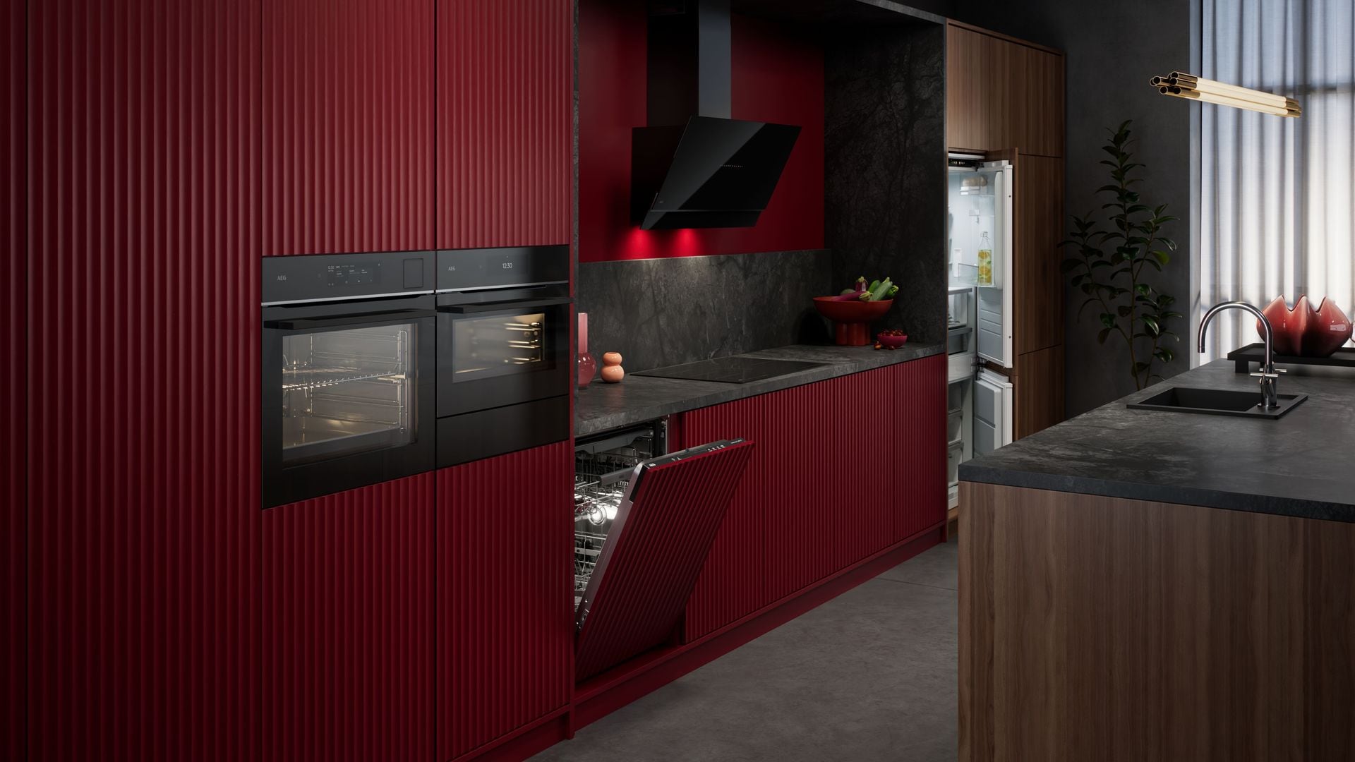 Cocina en color rojo, con el frigorífico y el lavavajillas integrados