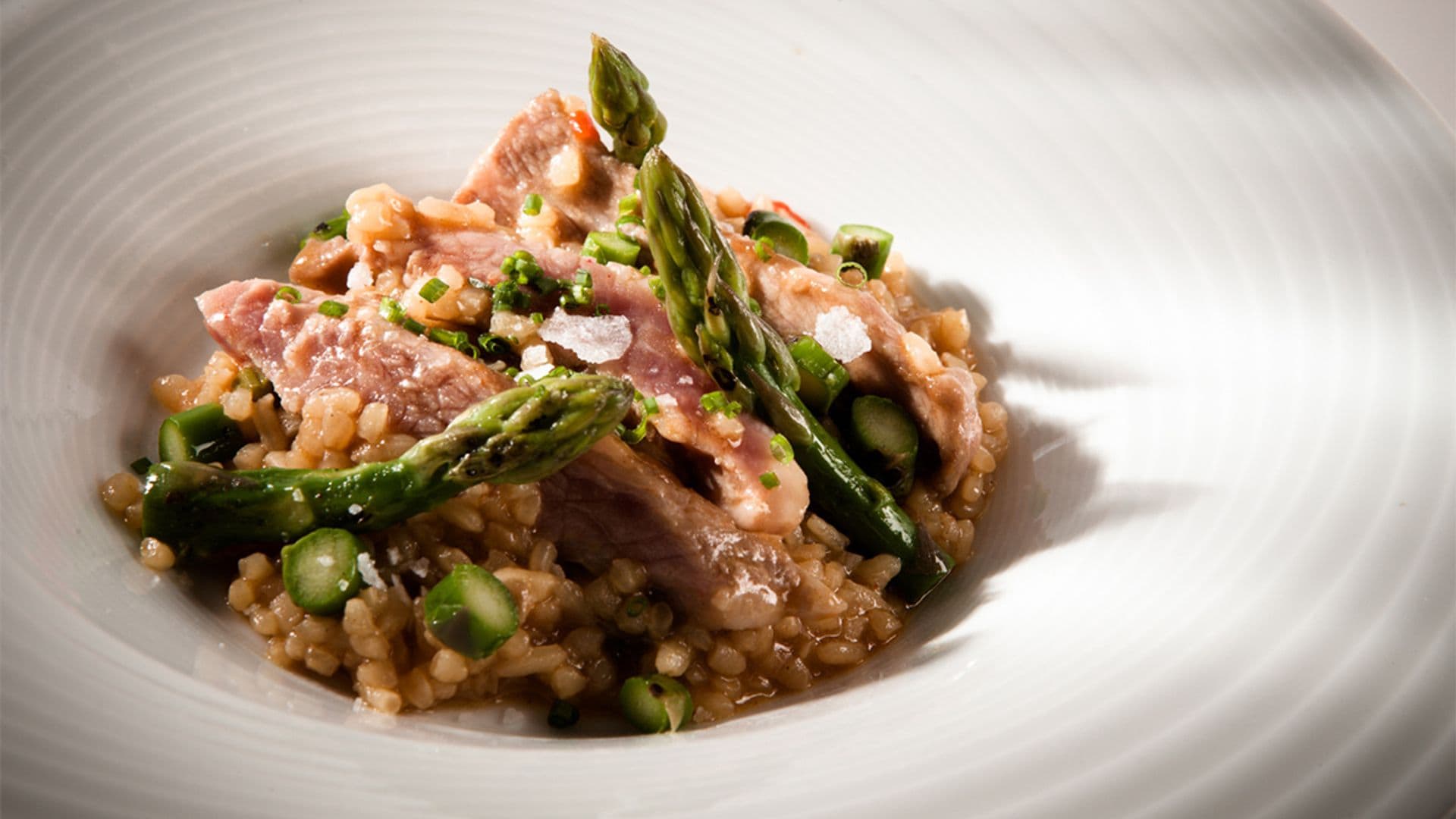 Secreto de bellota ibérico con arroz meloso de trigueros