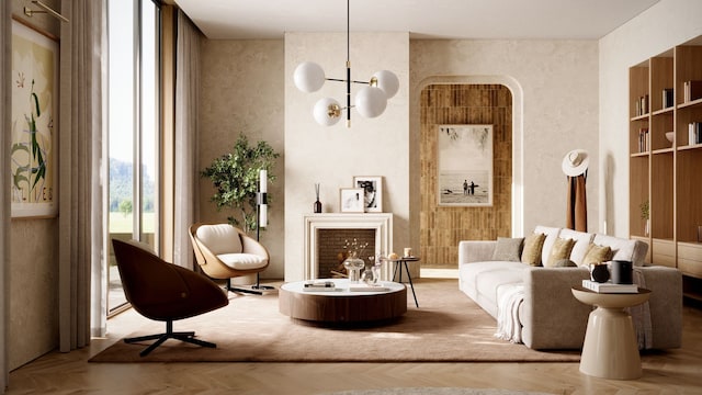 Salón con chimenea, estantería de madera, gran ventanal, alfombra, sofá claro, mesa de centro redonda, butacas, mesa auxiliar y lámpara de techo con globos blancos