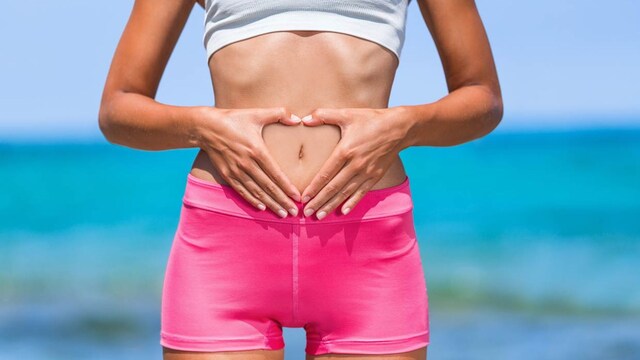 mujer dolor tripa