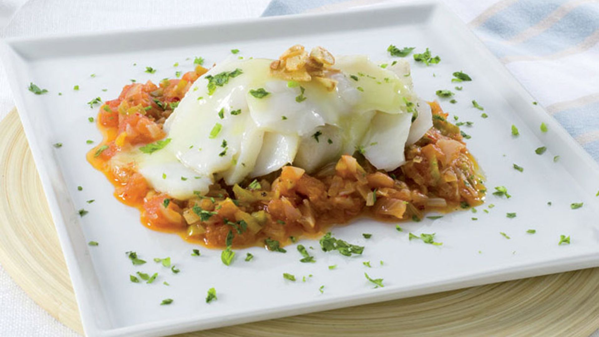 Bacalao con fritada de tomate