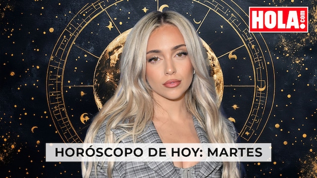 La cantante ana mena en primer plano, de fondo la rueda del zodiaco