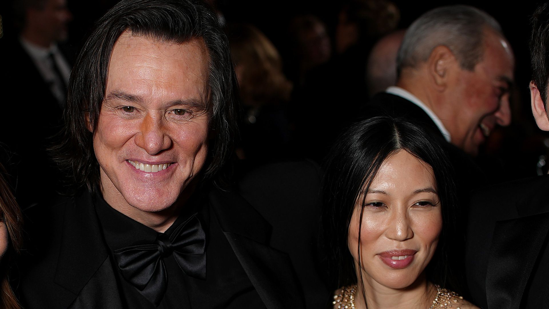 Jim Carrey y Min Ah posan durante la 51st Cesar Film Awards en Paris, France