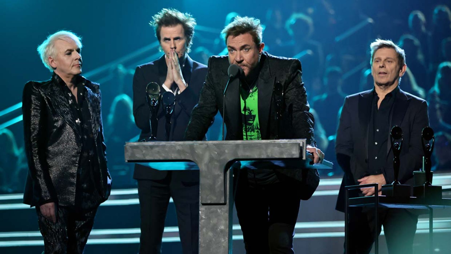 El vocalista de 'Duran Duran' lee una carta en nombre de su guitarrista, Andy Taylor, anunciando que padece cáncer
