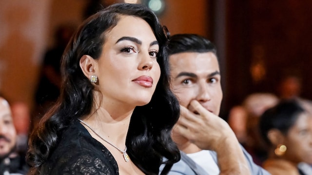 Cristiano Ronaldo (2nd L) and Georgina Rodriguez (L) attend the Globe Soccer Dubai Awards 2024 as part of the Dubai International Sports Conference 2024 in Dubai, United Arab Emirates (UAE) on December 27, 2024. (Photo by Waleed Zein/Anadolu via Getty Images)