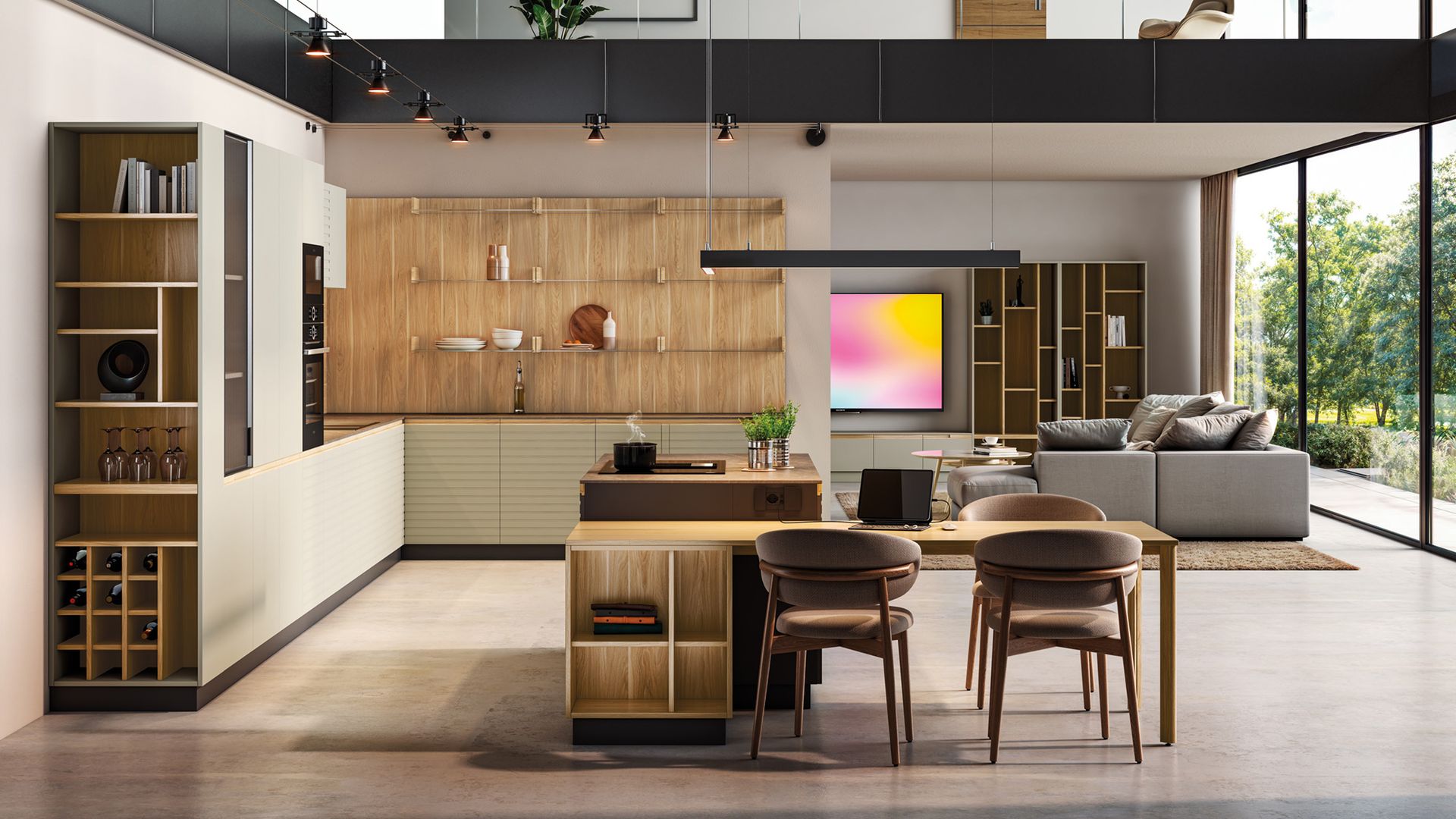 Cocina de madera abierta al salón y al comedor, con muebles crema y madera, mesa de cocina, botellero de madera y estantería