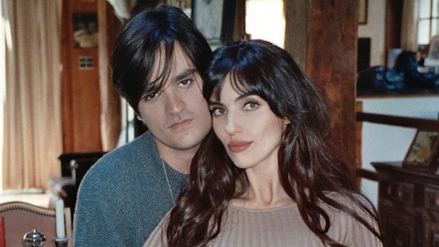 Alain-Fabien Delon y su pareja