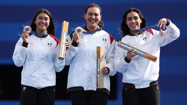 PARIS, FRANCE - JULY 28: Bronze medalists Angela Ruiz, Alejandra Valencia and Ana Vazquez of Team Mexico pose on the podium during the Archery medal ceremony after the Women's Team event on day two of the Olympic Games Paris 2024 at Esplanade Des Invalides on July 28, 2024 in Paris, France. (Photo by Alex Pantling/Getty Images)