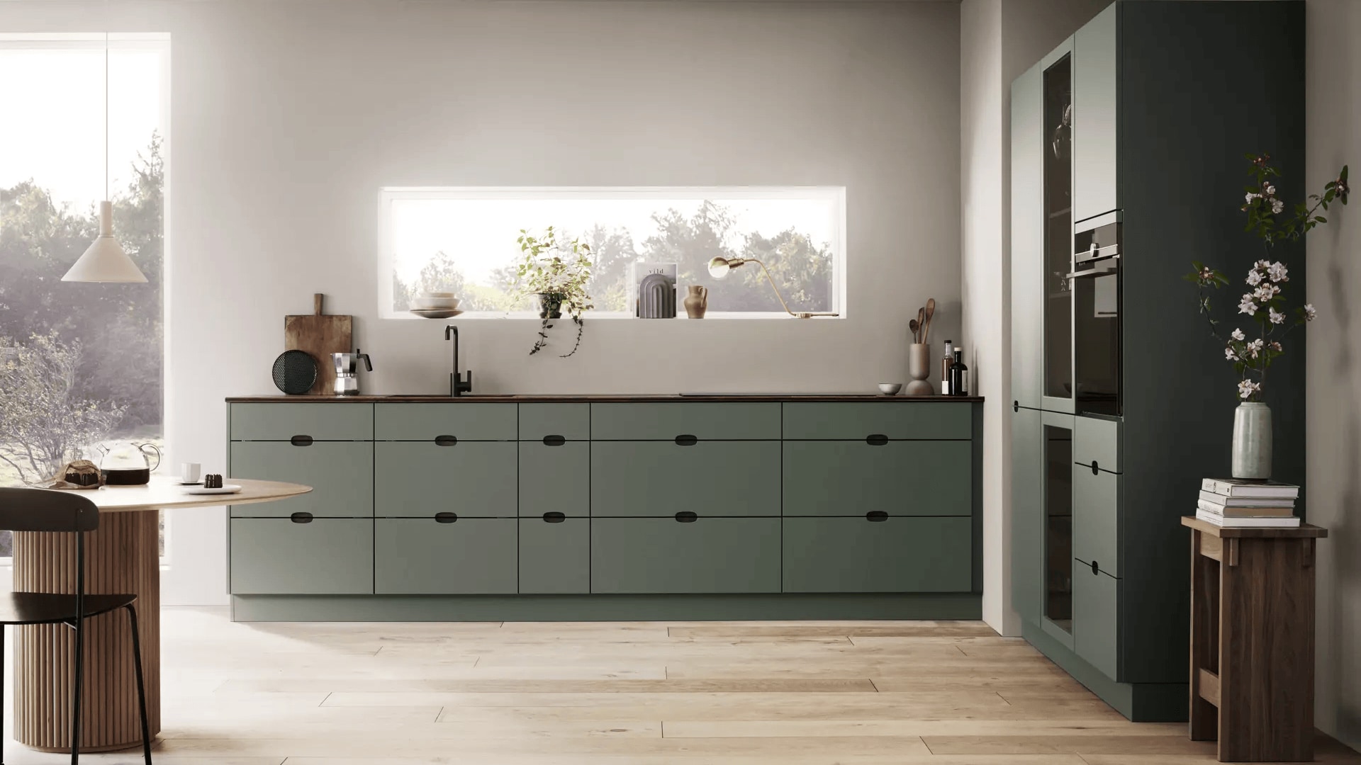 Cocina con muebles en verde
