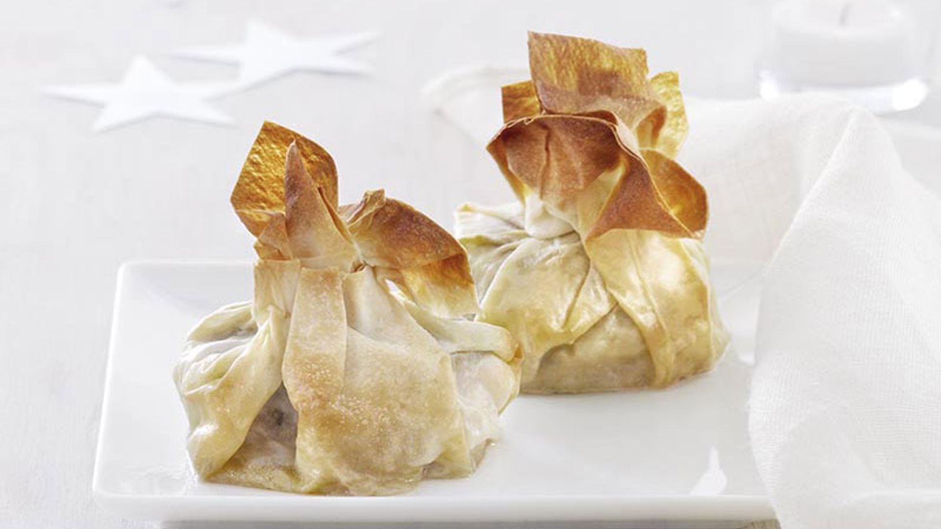 Bolsitas de hojaldre rellenas de medallones de cerdo