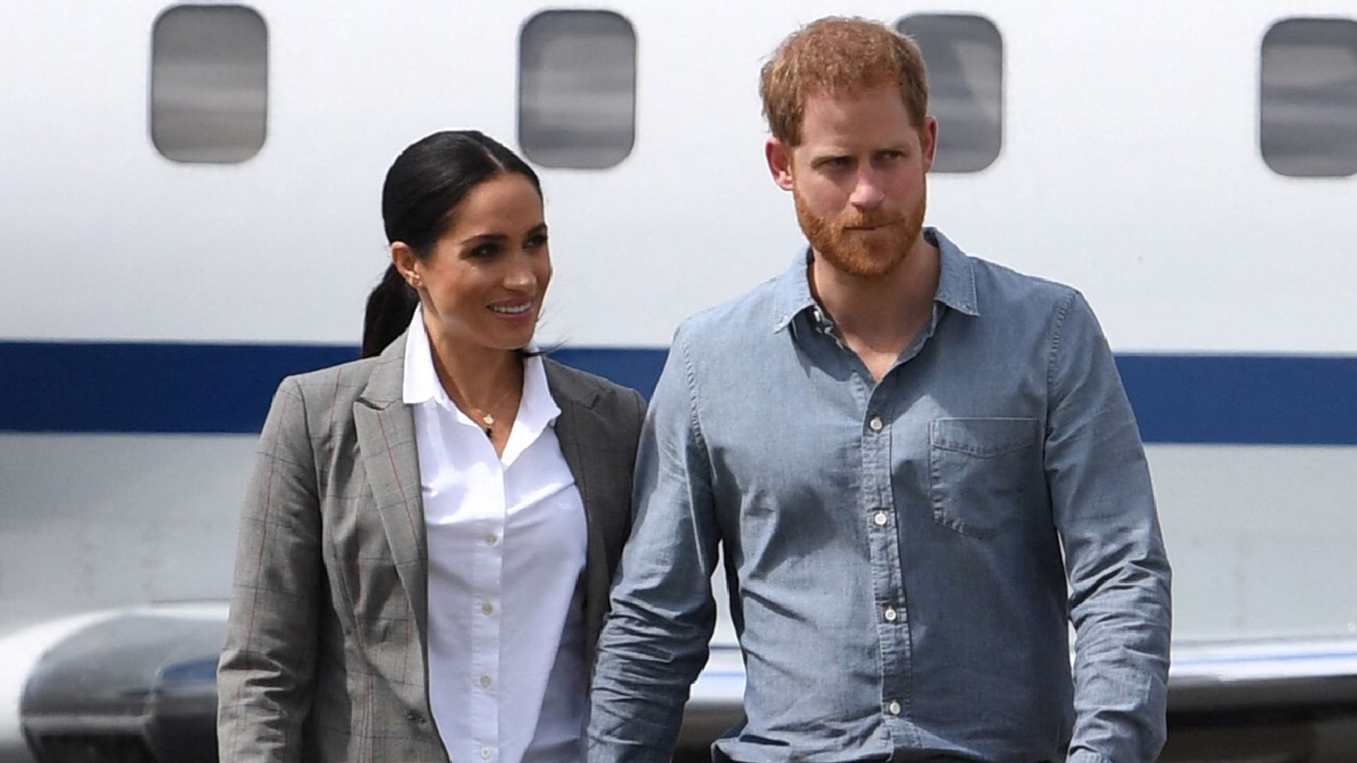 El príncipe Harry y Meghan Markle en un viaje a Australia en 2018.