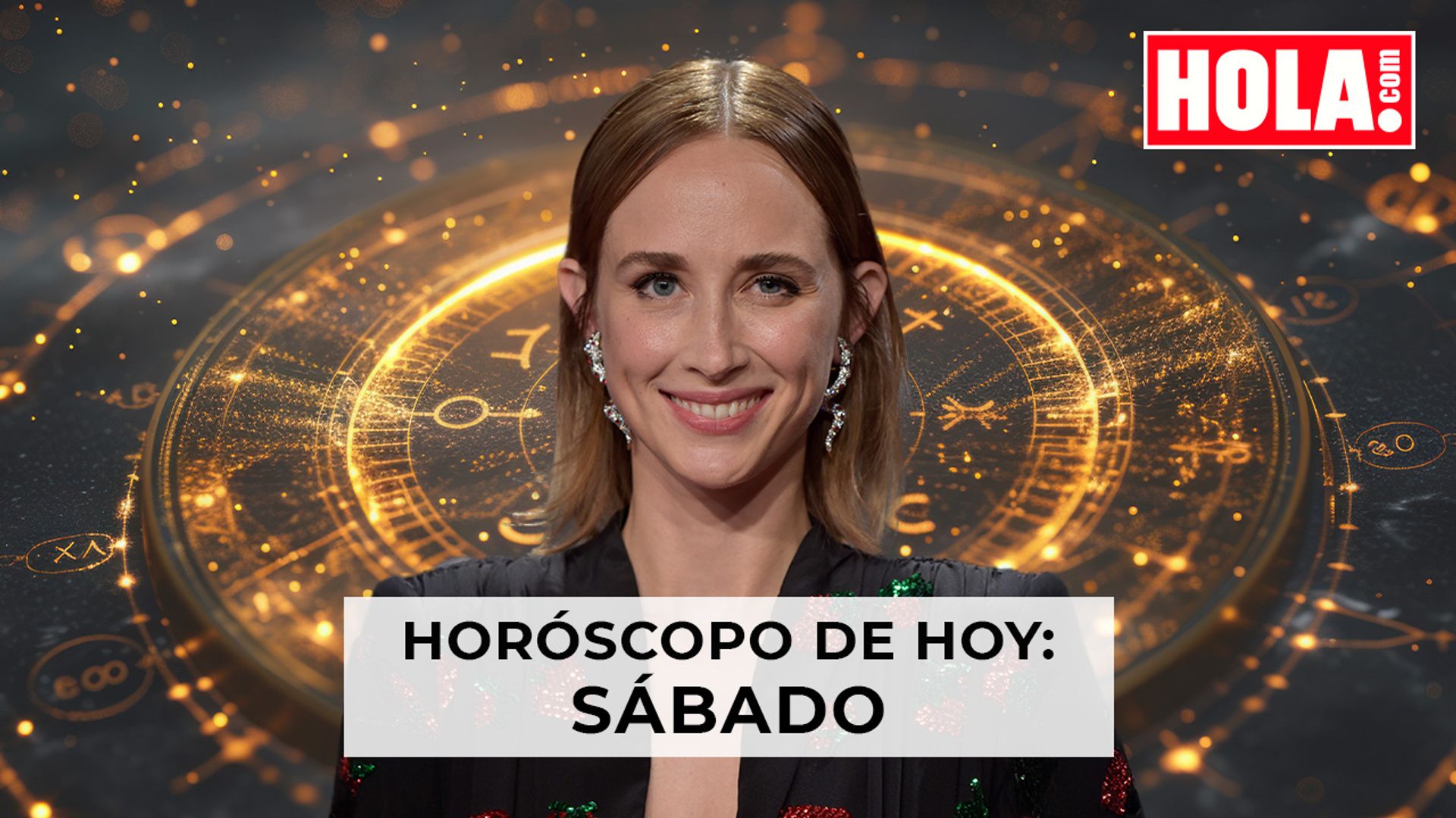 Ingrid García-Jonsson con la rueda del zodiaco detrás 