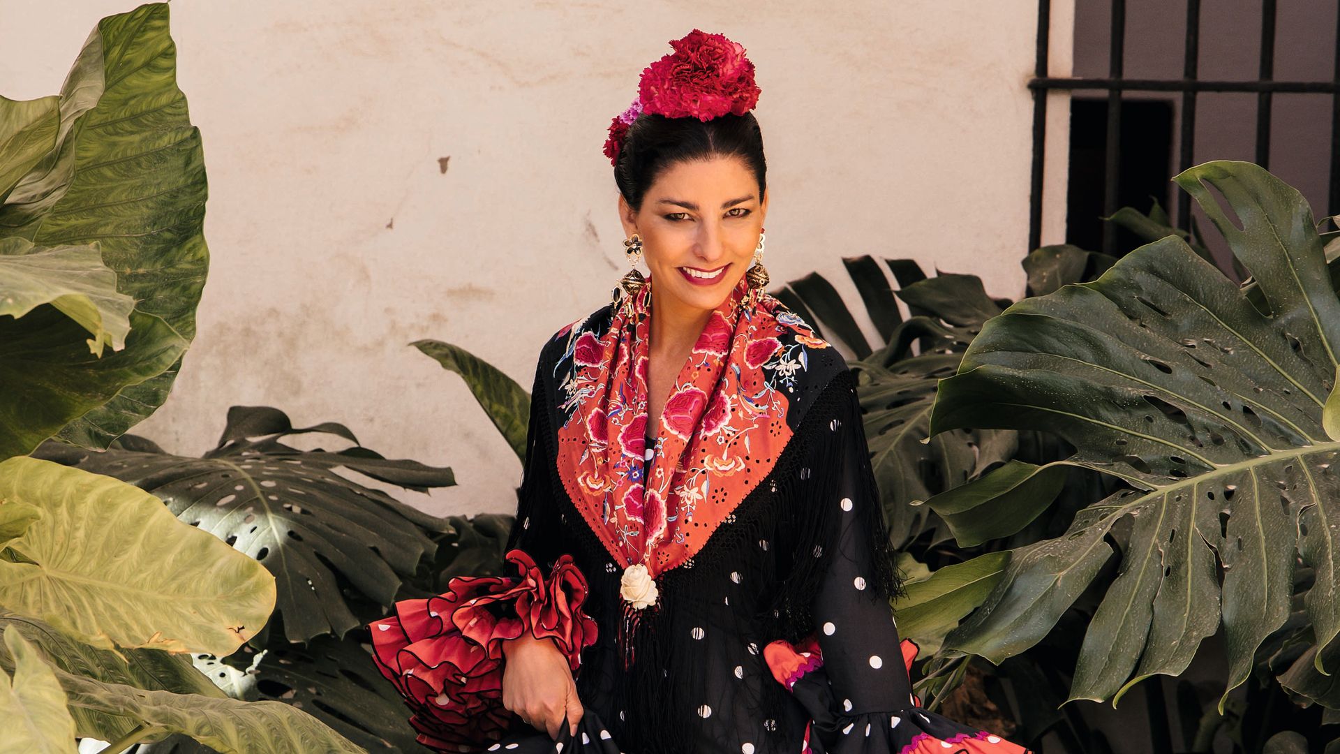 Rocío con uno de sus trajes de flamenca