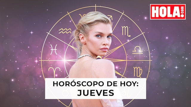 Stella Maxwell en primer plano, de fondo la rueda del zodiaco
