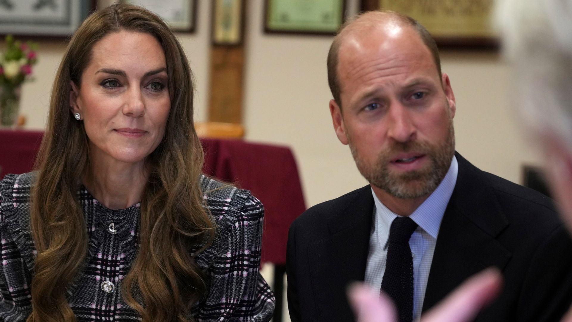Catherine, Princess of Wales and Prince William, Prince of Wales listen as they visit the National Federation of Women's Institute (WI) to commemorate the three-year anniversary of the death of Queen Elizabeth II on September 8, 2025 in Sunningdale, England