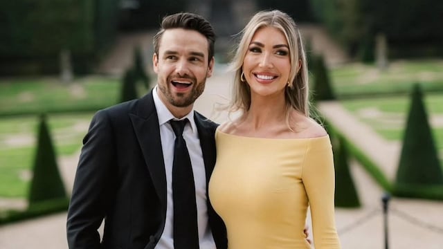 Kate Cassidy posando a Liam Payne en un evento elegante