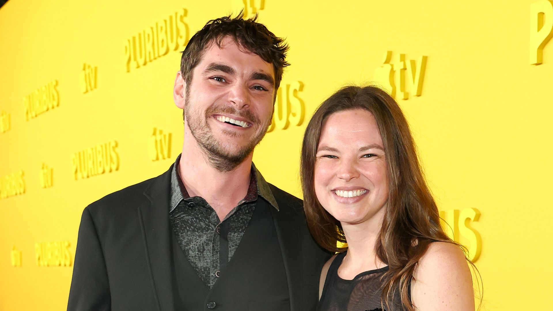 LOS ANGELES, CALIFORNIA - NOVEMBER 04: (L-R) RJ Mitte and Kennedy Suarez attend the world premiere of Apple TV+'s "Pluribus" at DGA Theater Complex on November 04, 2025 in Los Angeles, California. (Photo by Monica Schipper/GA/The Hollywood Reporter via Getty Images)
