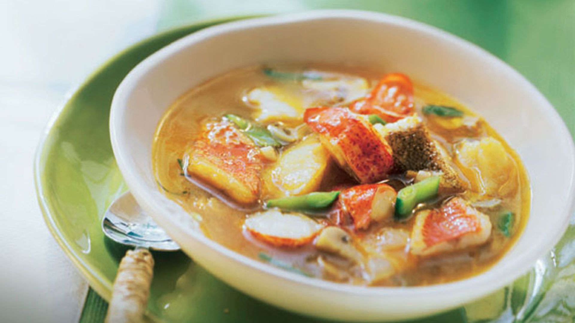 Suquet de bogavante y pescado con tirabeques