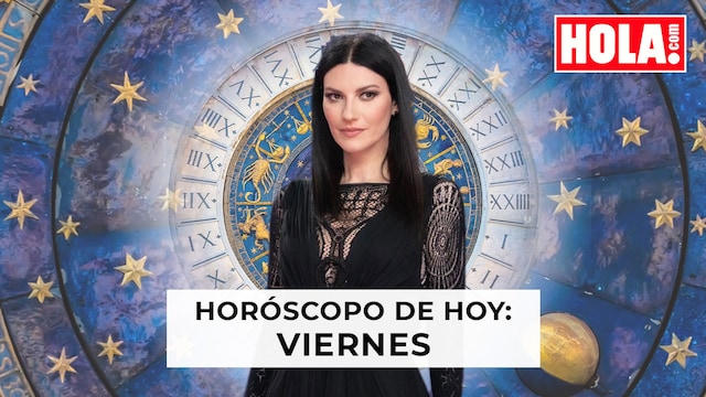 Laura Pausini en primer plano, de fondo la rueda del zodiaco