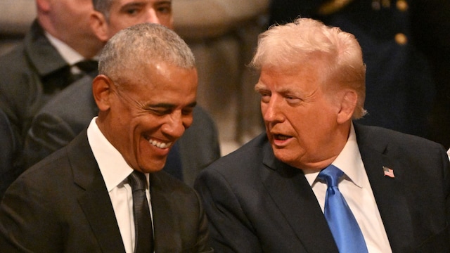 TOPSHOT - Former US President Barack Obama speaks with President-elect Donald Trump before the State Funeral Service for former US President Jimmy Carter at the Washington National Cathedral in Washington, DC, on January 9, 2025. (Photo by ROBERTO SCHMIDT / AFP) (Photo by ROBERTO SCHMIDT/AFP via Getty Images)