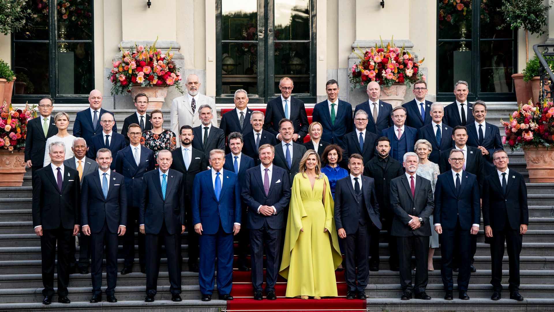 NATO country leader, Turkey's President Recep Tayyip Erdogan (3rdL), US President Donald Trump (4thL), France's President Emmanuel Macron (4thR), NATO Secretary General Mark Rutte  (Rear C) pose with King Willem-Alexander (C-L) and Queen Maxima (C-R) of the Netherlands for a family photo as they attend a social dinner at the 'Huis ten Bosch' Royal Palace during a North Atlantic Treaty Organization (NATO) Heads of State and Government summit in The Hague, on June 24, 2025. NATO leaders hold a two-day summit on June 24 and 25 in The Hague. (Photo by Haiyun Jiang / POOL / AFP) (Photo by HAIYUN JIANG/POOL/AFP via Getty Images)          