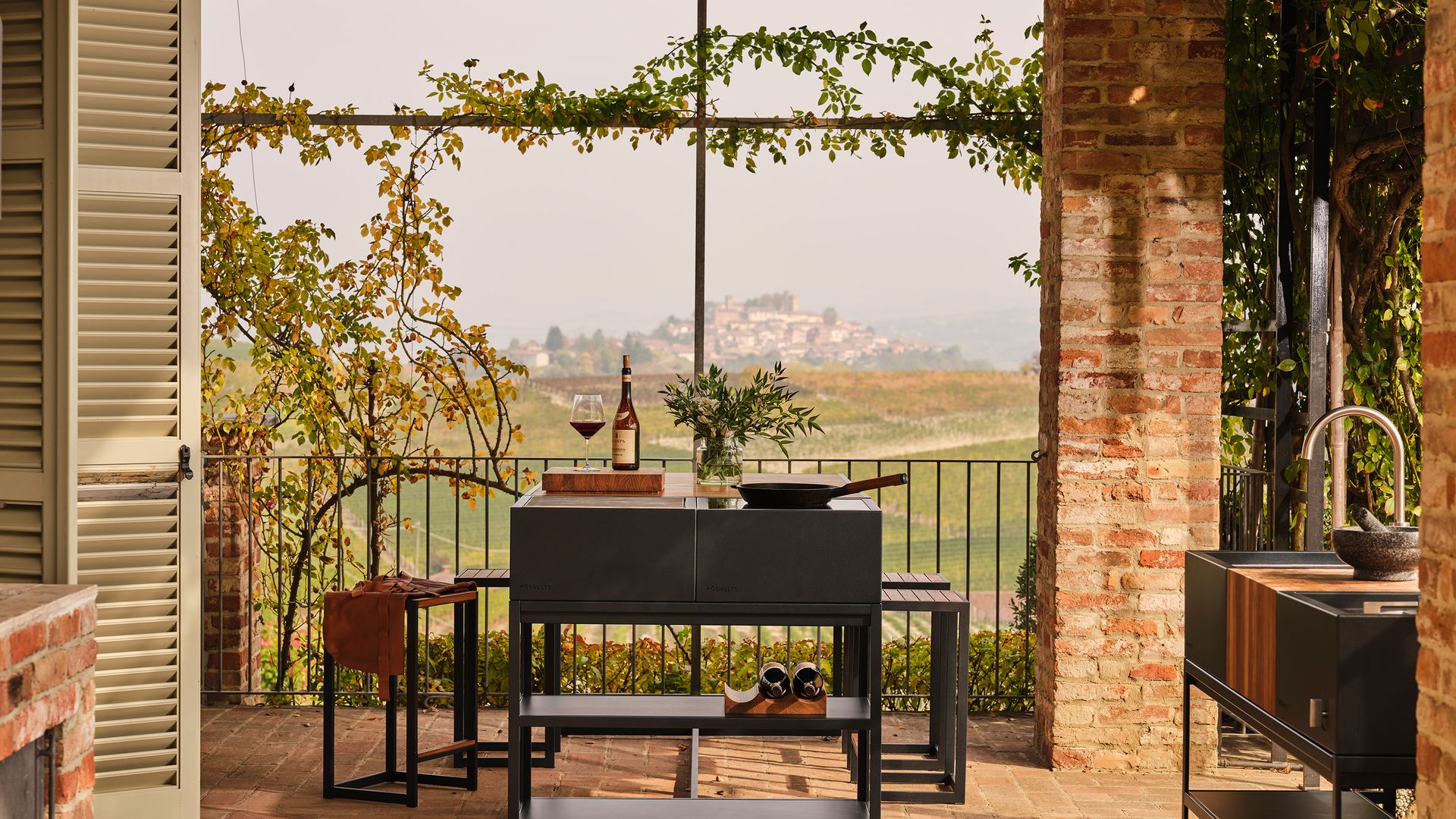 Terraza con cocina de exterior