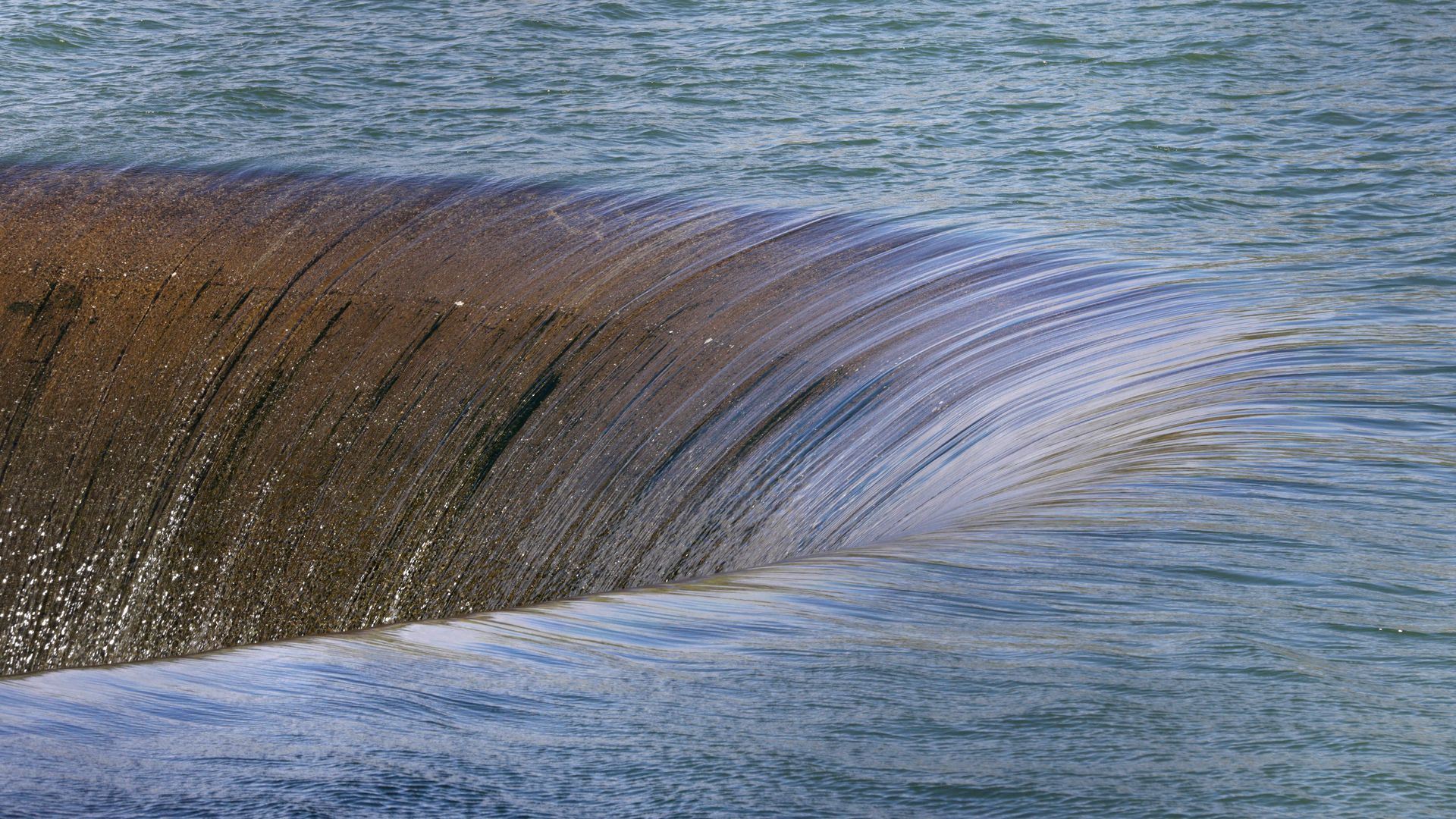 The "Glory Hole" spillway is on display for the first time since 2019 at Lake Berryessa in Napa, Calif., Thursday, March 13, 2025. (BrontÃ« Wittpenn/San Francisco Chronicle via AP)