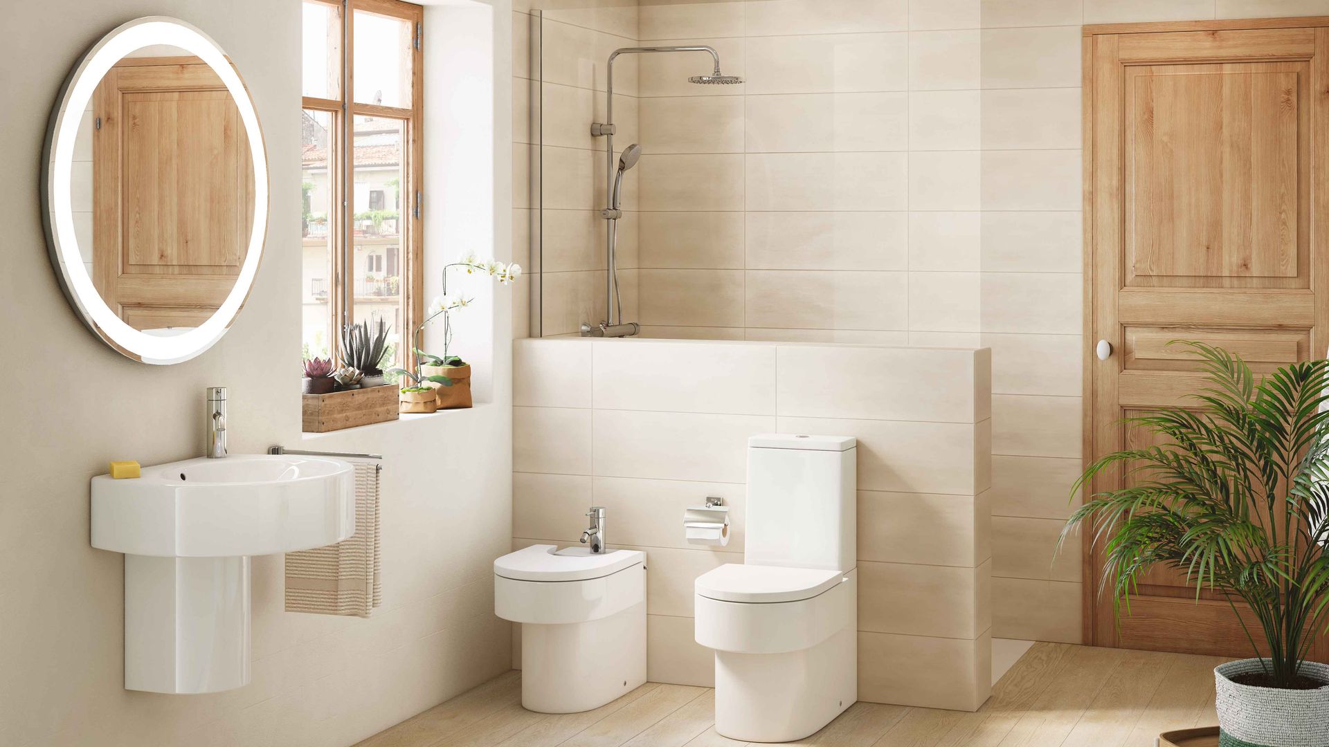 Baño con ducha, con medio murete y cristal en lugar de mampara, mucha luz, espejo redondo con luz, plantas, puerta de madera