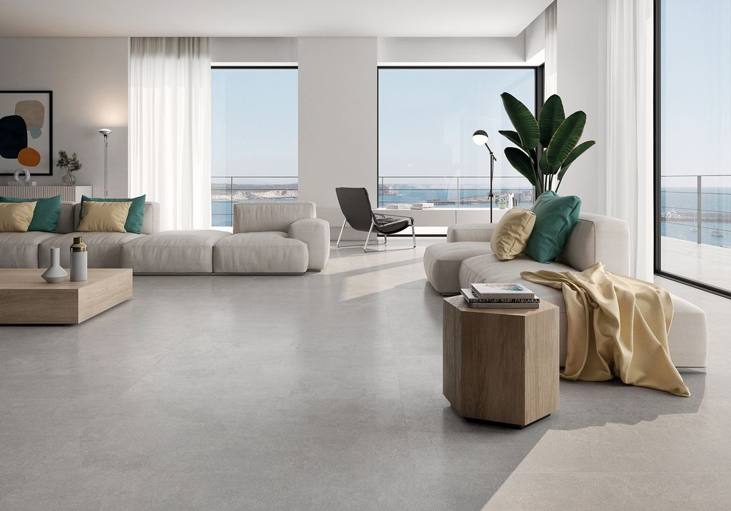 Salón con suelo porcelánico efecto cemento