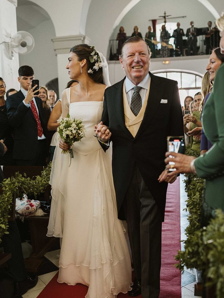 César con su hija, Patricia, en el día de su boda