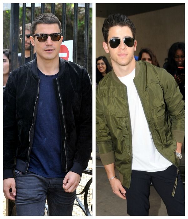 Nick Jonas con cazadora bomber, camiseta y pantalón vaquero en Londres...
