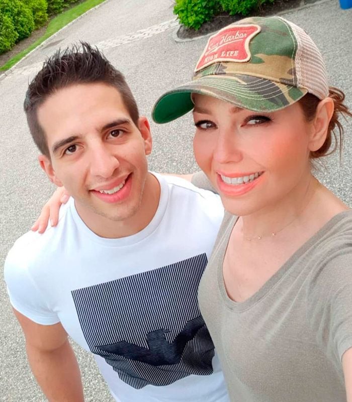 Thalía y su entrenador