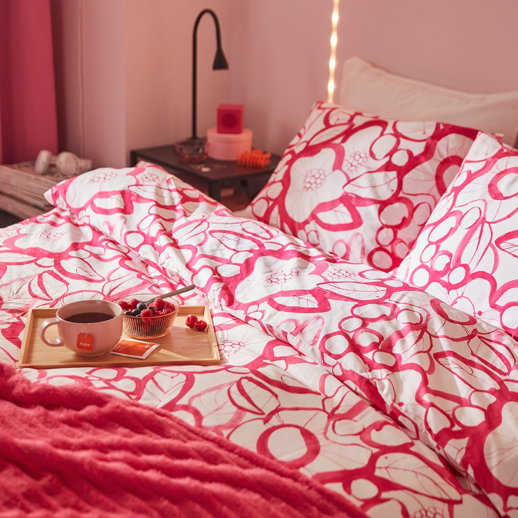 Ropa de cama con estampado en rosa y blanco