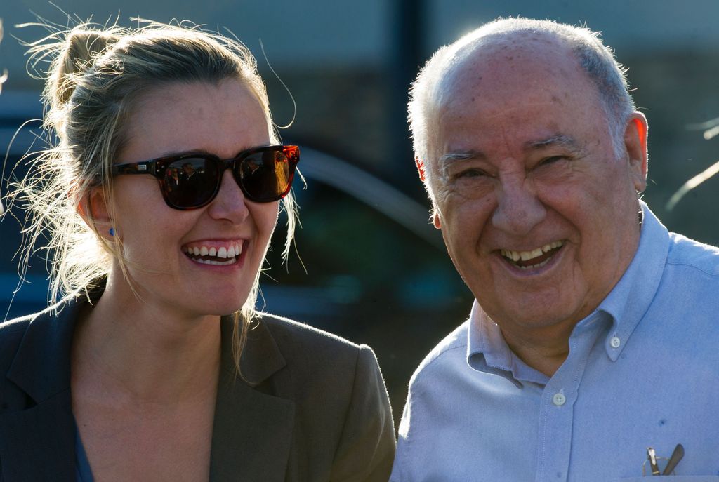 Amancio Ortega junto a su hija Marta. 