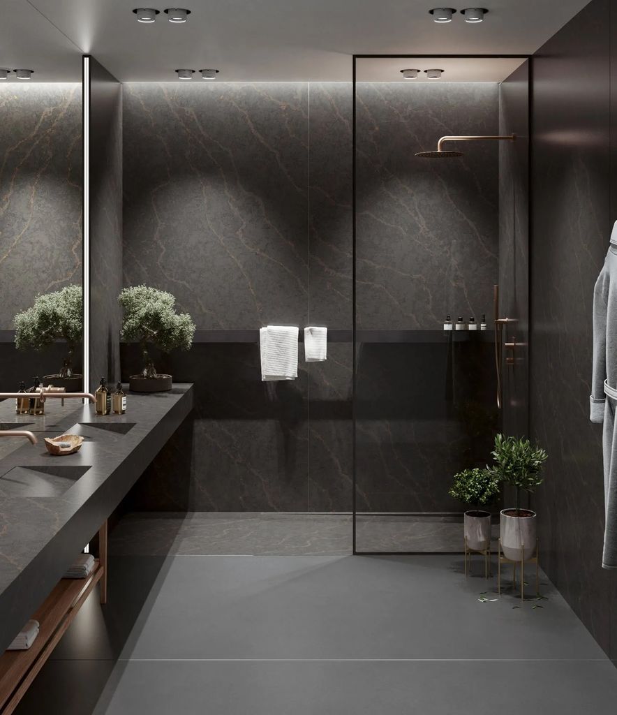 El gris domina un baño para compartir de tendencia