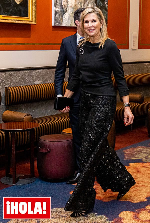 Máxima de Holanda: look negro con pantalones 'palazzo' de lentejuelas