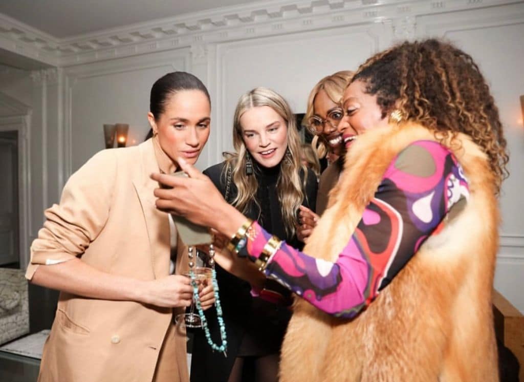 Meghan con algunas invitadas del evento.