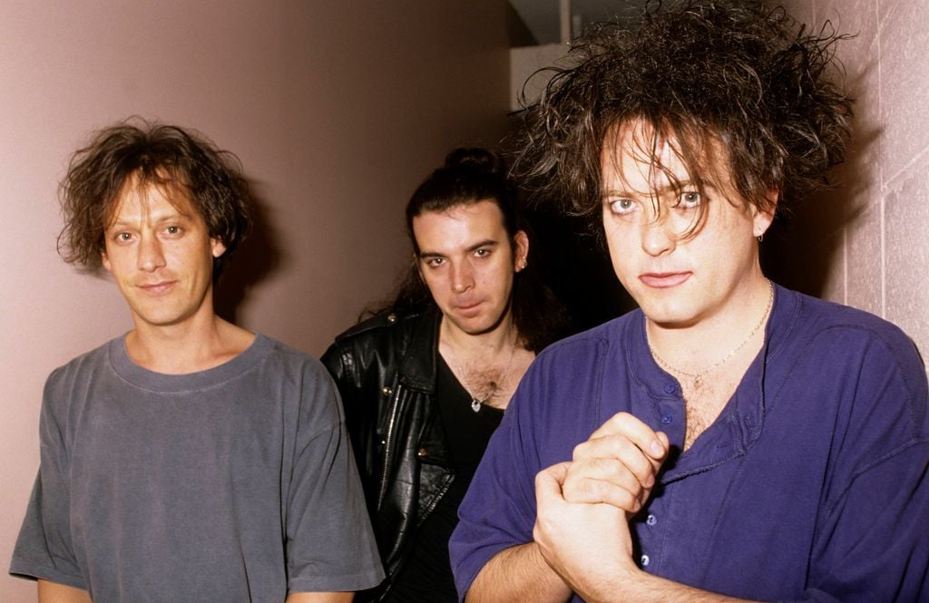 Robert Smith, Simon Gallup y Perry Bamonte