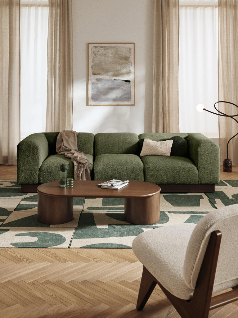 Salón con sofá verde