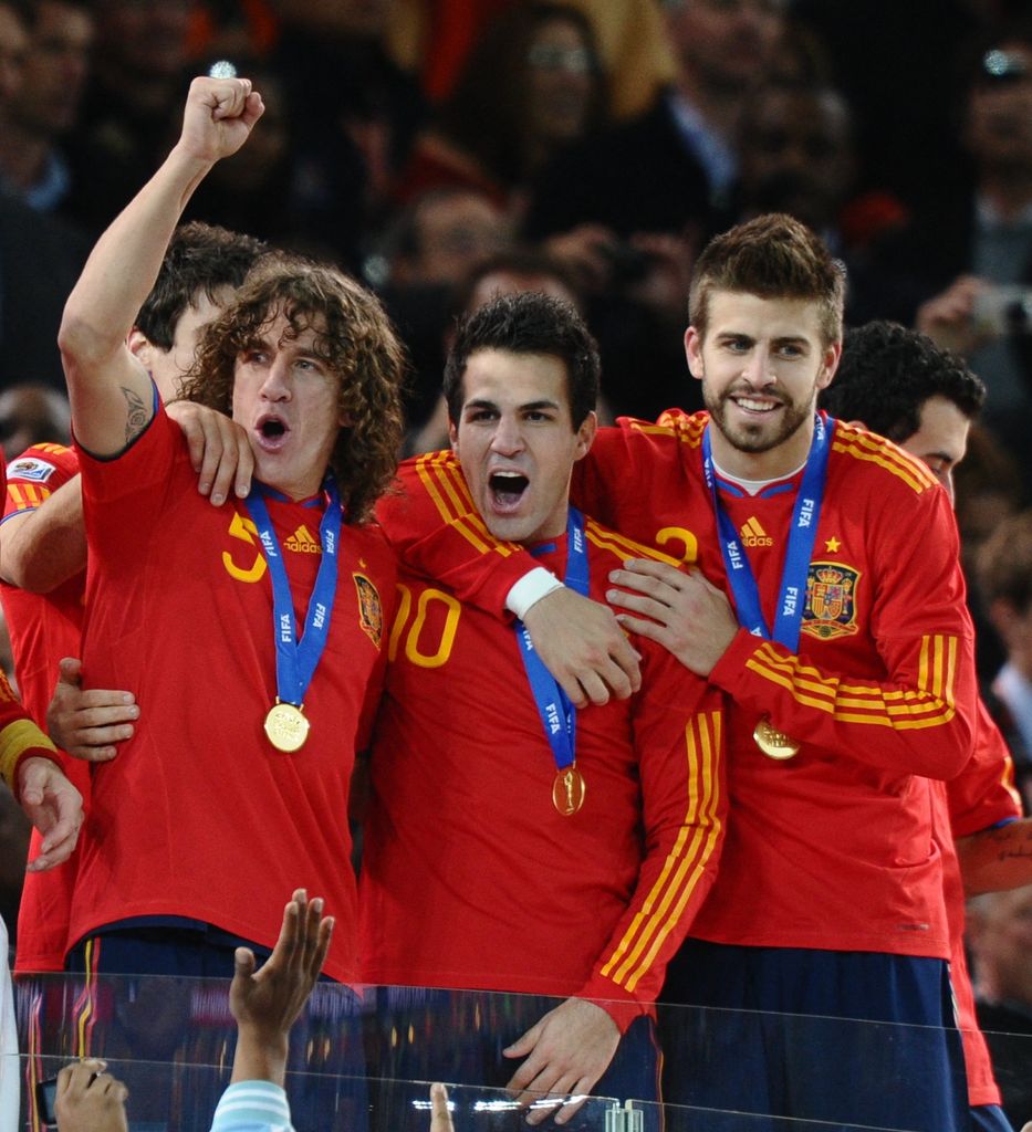 Gerard Pique, Cesc Fábregas y Carles Puyol celebrando su triunfo en el Mundial de 2010