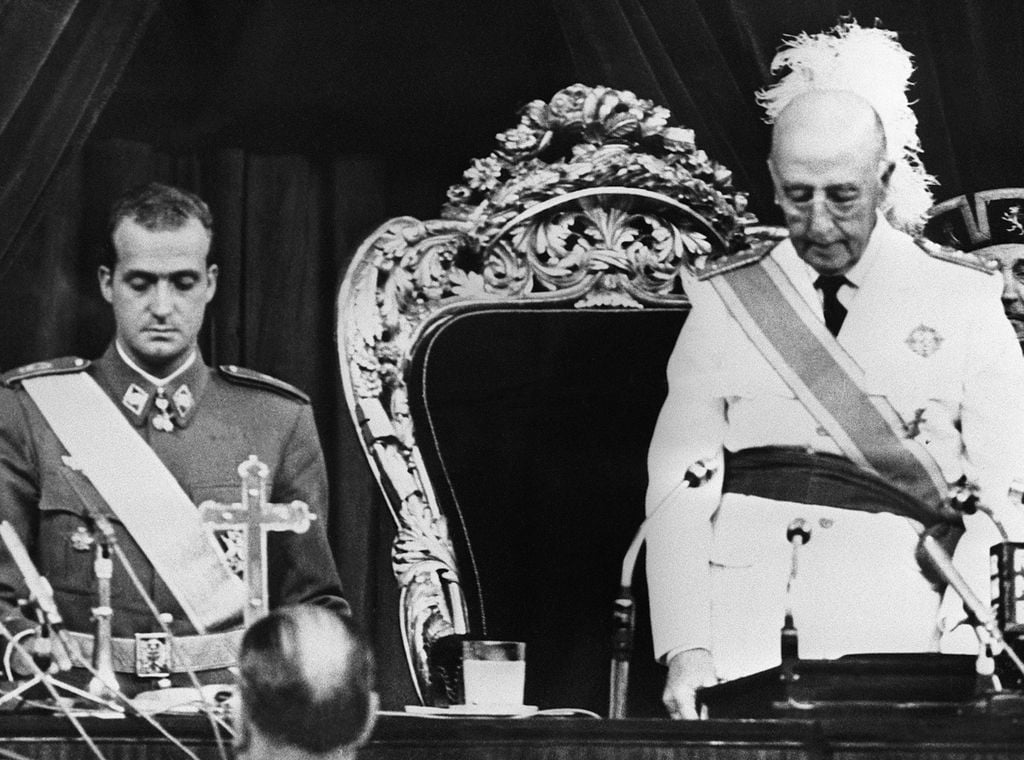 Prince (later King) Juan Carlos (left) with Spain's dictator General Francisco Franco. (Photo by: Photo 12/ Universal Images Group via Getty Images)