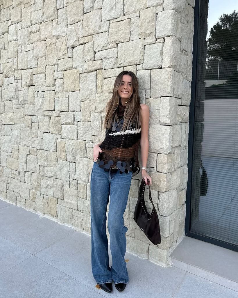 vaqueros y blusa de tirantes